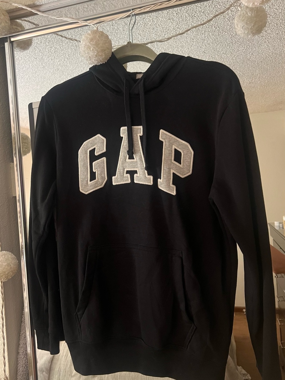 men’s black gap hoodie with gray lettering